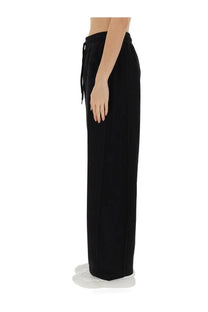Stella McCartney women’s black wide-leg jogging pants with a drawstring waistband for casual wear