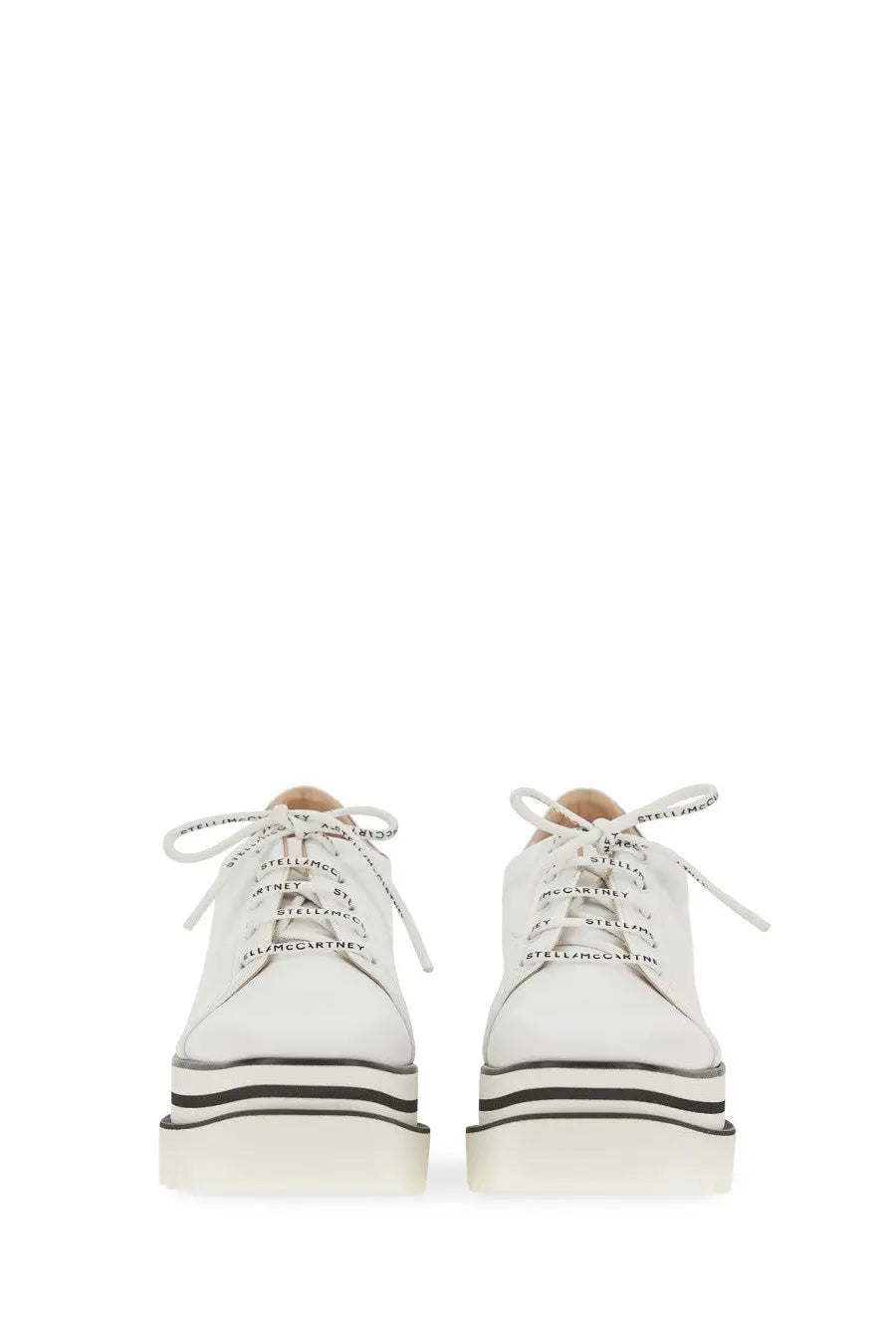 Stella mccartney women’s white leather platform sneakers with black striped soles and branded laces