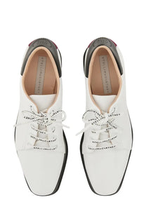 Stella McCartney women’s white leather lace-up shoes with black accents and branded laces