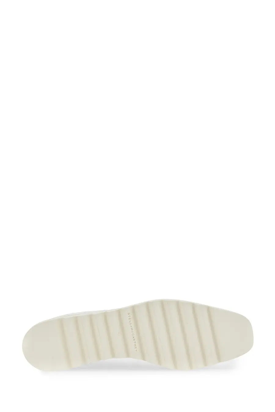 Stella McCartney women’s lace white shoe with white rubber sole featuring ribbed texture and embossed branding center