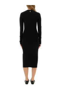 Stella McCartney women’s black midi dress with fitted silhouette and subtle back detail shown from the back side