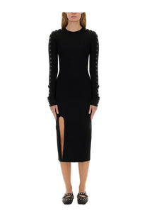 Stella McCartney women’s black midi dress with long sleeves silver-toned studs and side slit in sleek fabric