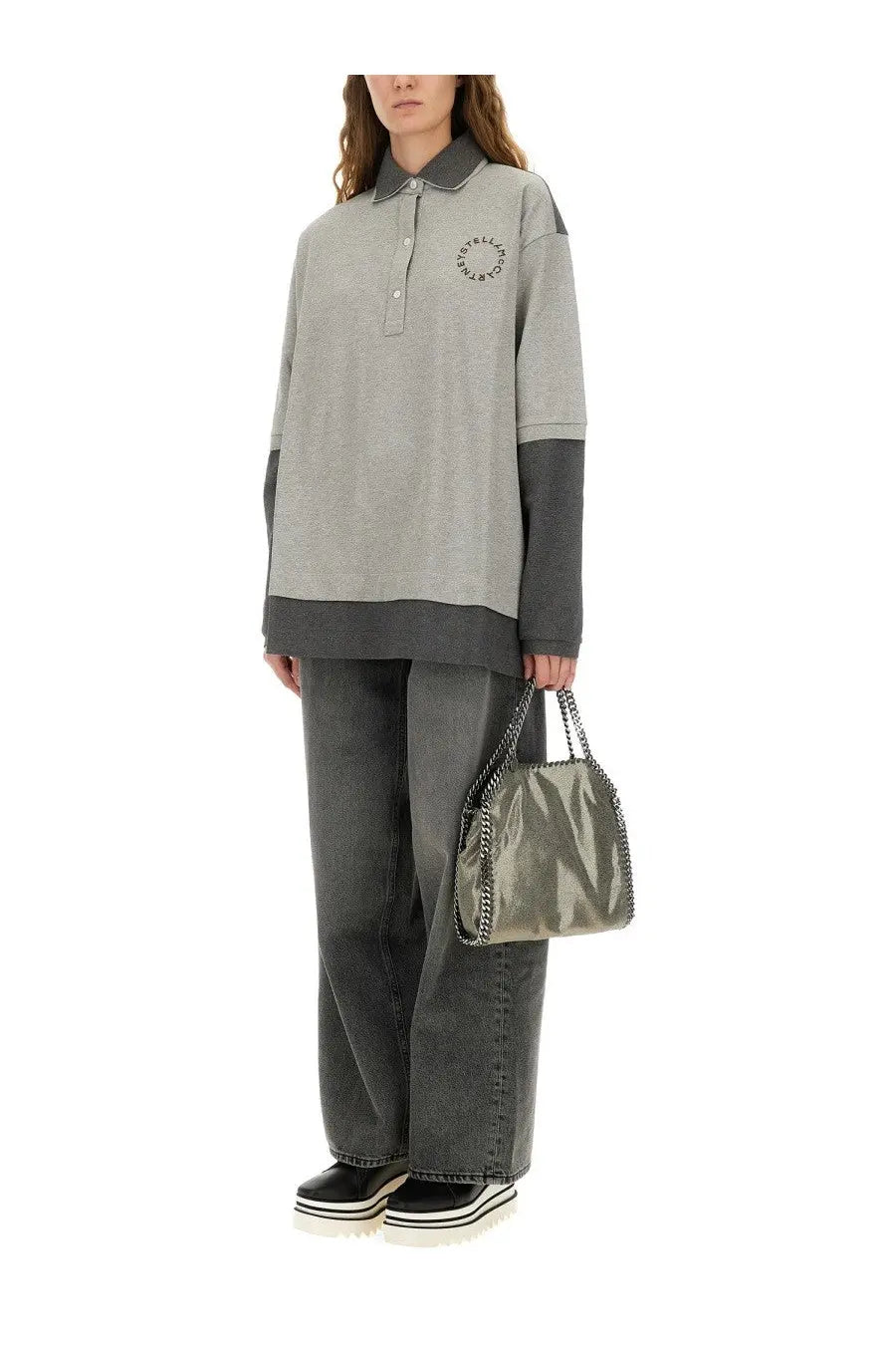 Metallic olive green chain-strap handbag with soft structured body paired with stella mccartney women’s oversize polo grey