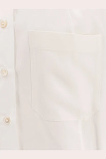 Stella McCartney women’s oversize satin shirt white with crisp white fabric chest pocket and cream-colored buttons