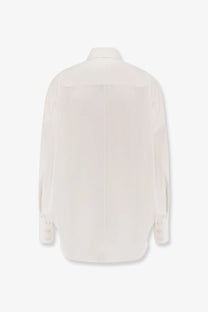 A sleek off-white silk Stella McCartney women’s oversize satin shirt with classic collar and buttoned cuffs