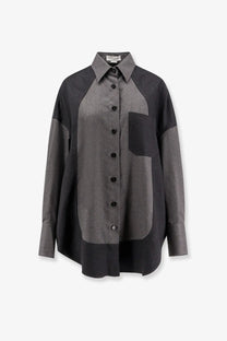 Stella McCartney women’s oversize wool shirt in dark gray patchwork with black collar cuffs and pocket accents