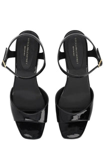 Stella mccartney women’s black patent leather wedge sandals with minimalist design and gold-tone buckle accents