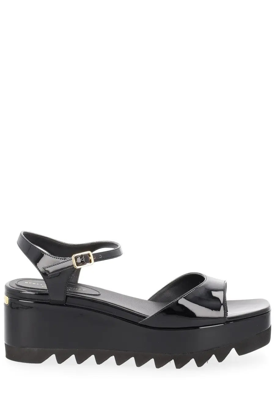 Stella McCartney women’s black patent leather platform sandal with gold-tone buckle and serrated sole front view