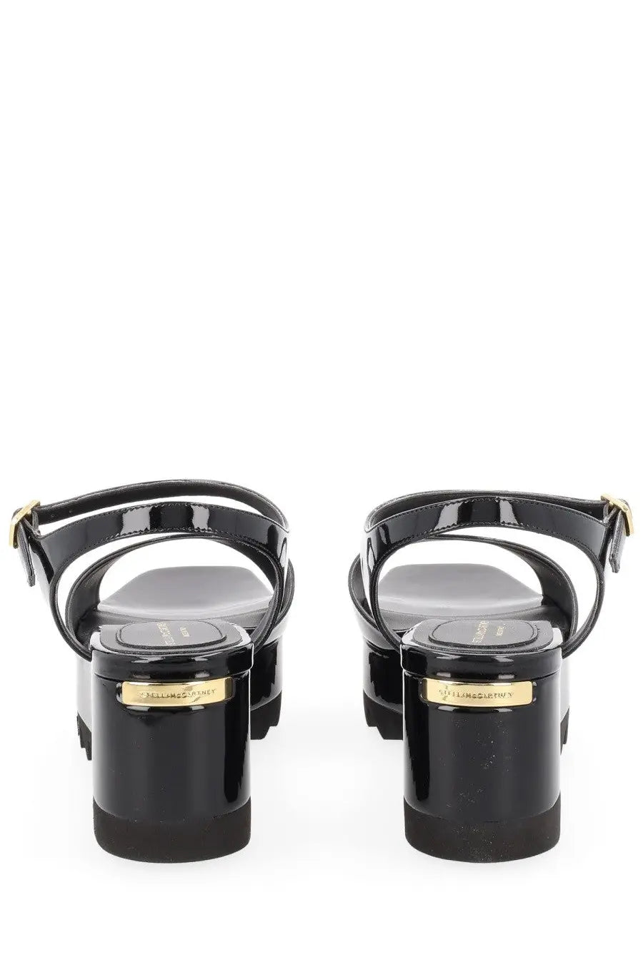 Stella McCartney women’s sandal Elyse black showing the back of black patent leather platform sandals with gold branding