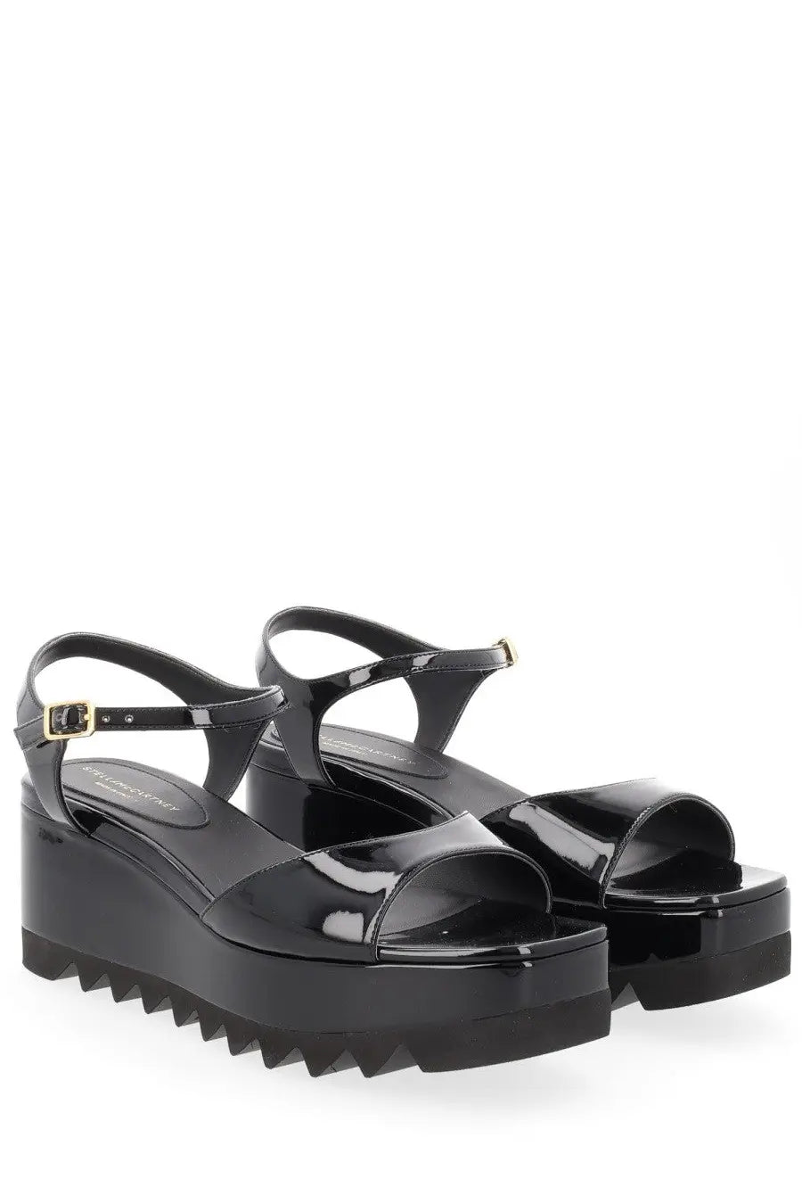 Stella McCartney women’s black patent leather platform sandals with chunky serrated sole and gold buckle accents