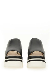 Stella mccartney women’s black leather platform sandals with white and black striped sole for stylish wear