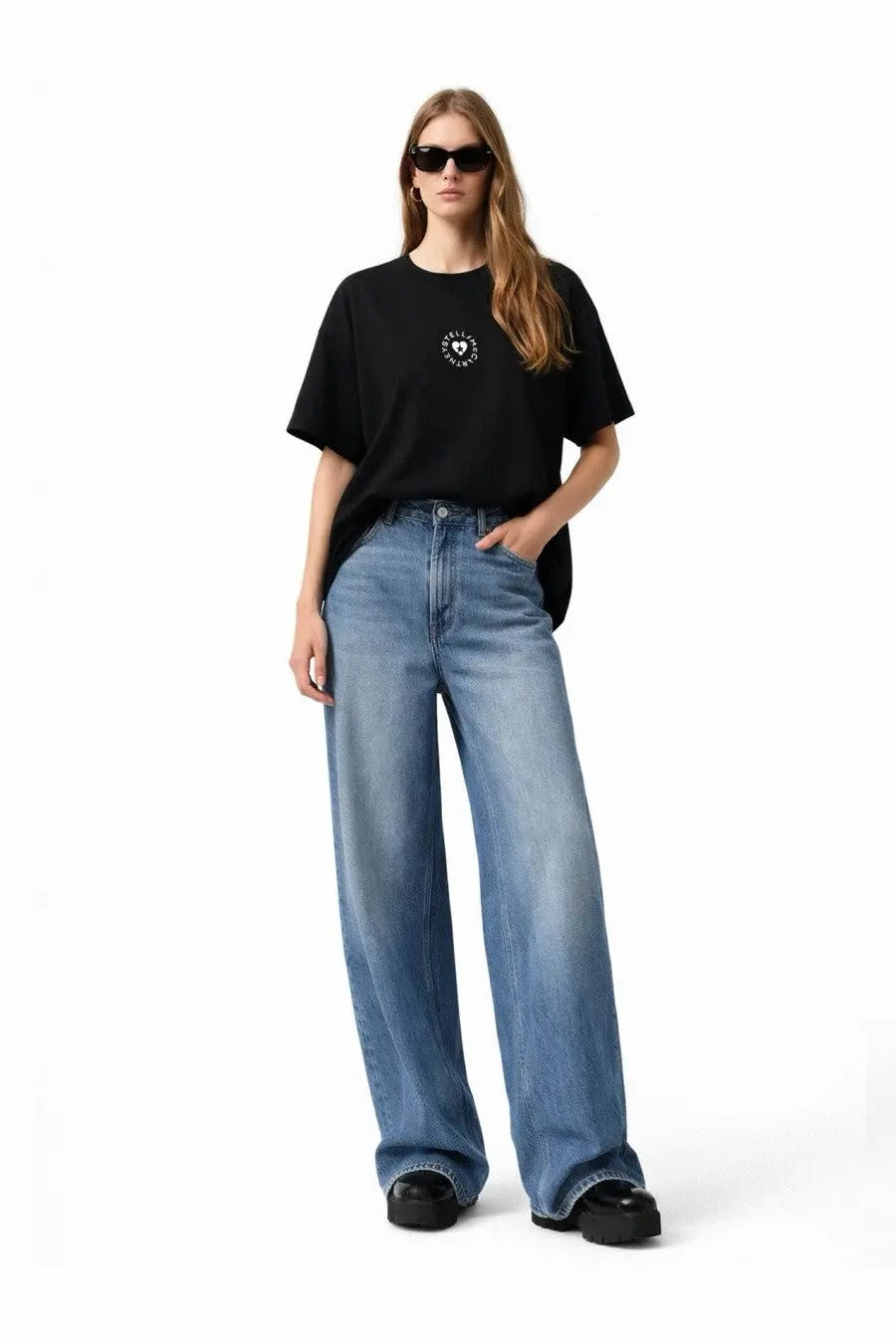 Stella mccartney women’s black short-sleeved t-shirt with white circular logo on chest made from soft fabric