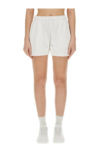 Stella McCartney women’s white drawstring shorts with relaxed fit and subtle side pockets in lightweight fabric