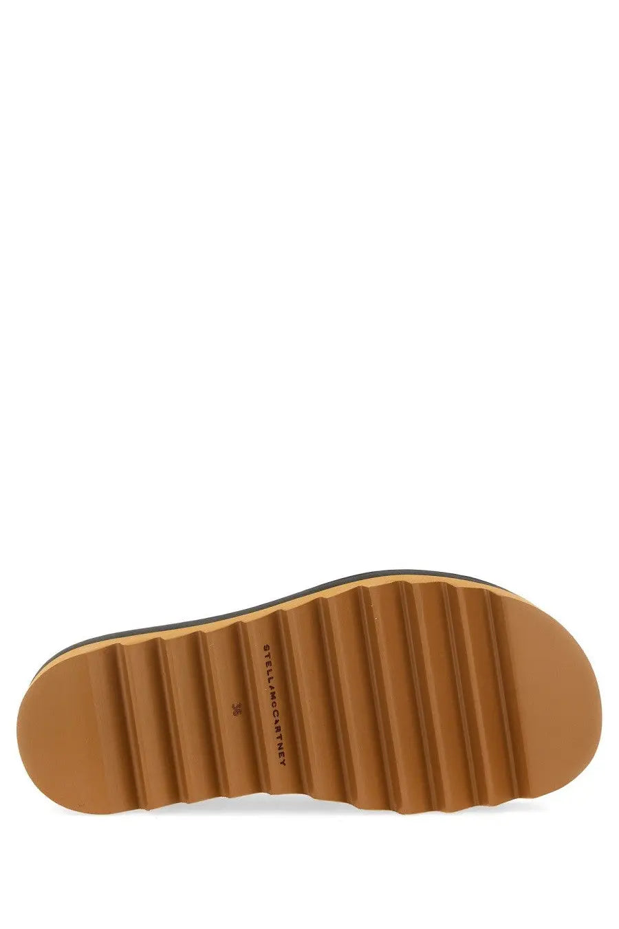 Tan rubber sole with ribbed texture and black edge featuring givenchy brand on stella mccartney women’s black sneak slyse slipper