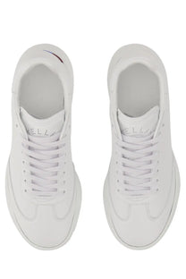 Stella McCartney women’s white leather sneakers with chunky sole and subtle branding on the tongue