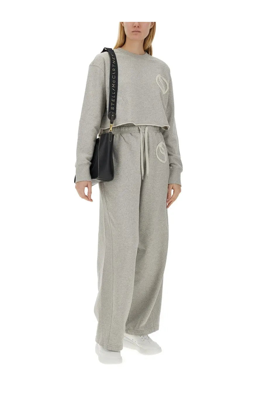 Stella McCartney women’s gray cropped sweatshirt with white embroidered logo, relaxed fit, and ribbed cuffs