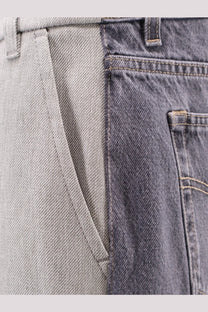 Stella McCartney women’s tailoring mixed trousers grey featuring two-tone denim jeans with light gray and dark blue panels