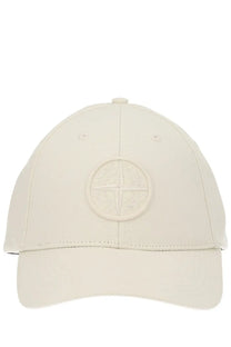 Stone Island men’s cream baseball cap with subtle embossed compass rose logo on the front in white color