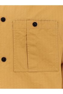 Mustard-yellow stone island men’s cotton shirt pocket with black button fastenings on canvas fabric