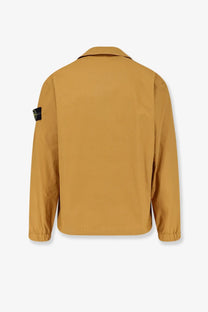 Stone island men’s cotton shirt yellow featuring a tan long-sleeved jacket with collar and elastic cuffs