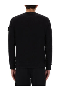 Stone Island men’s black cotton sweatshirt with long sleeves and a small rectangular patch on the left sleeve