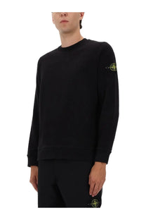 Stone Island men’s black cotton sweatshirt with neon yellow compass logos on left sleeve and lower right leg