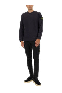 Stone island men’s cotton sweatshirt grey in black with a yellow logo patch on the left sleeve