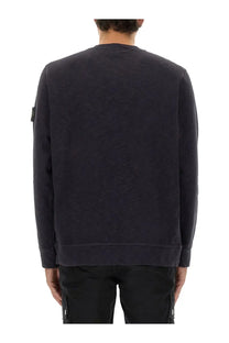 Stone Island men’s grey cotton sweatshirt with dark gray texture ribbed hem cuffs and small logo patch on left sleeve