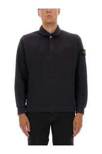 Stone island men’s cotton vanisé polo shirt in black with subtle texture and yellow logo patch on left sleeve