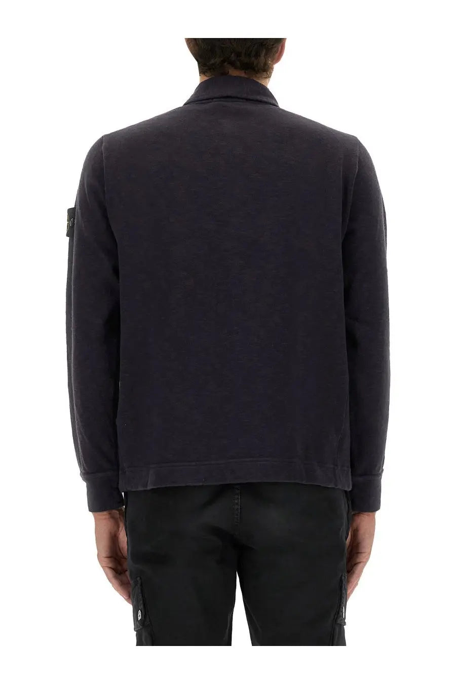 Stone island men’s dark navy blue cotton vanisé jacket with textured fabric and black logo patch on left sleeve
