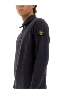 Stone Island men’s cotton vanisé polo shirt in dark navy with long sleeves and yellow logo patch on left sleeve