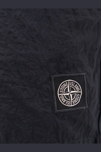 Stone island men’s econylon swim trunks blue with black stone island patch and white embroidered logo on textured fabric