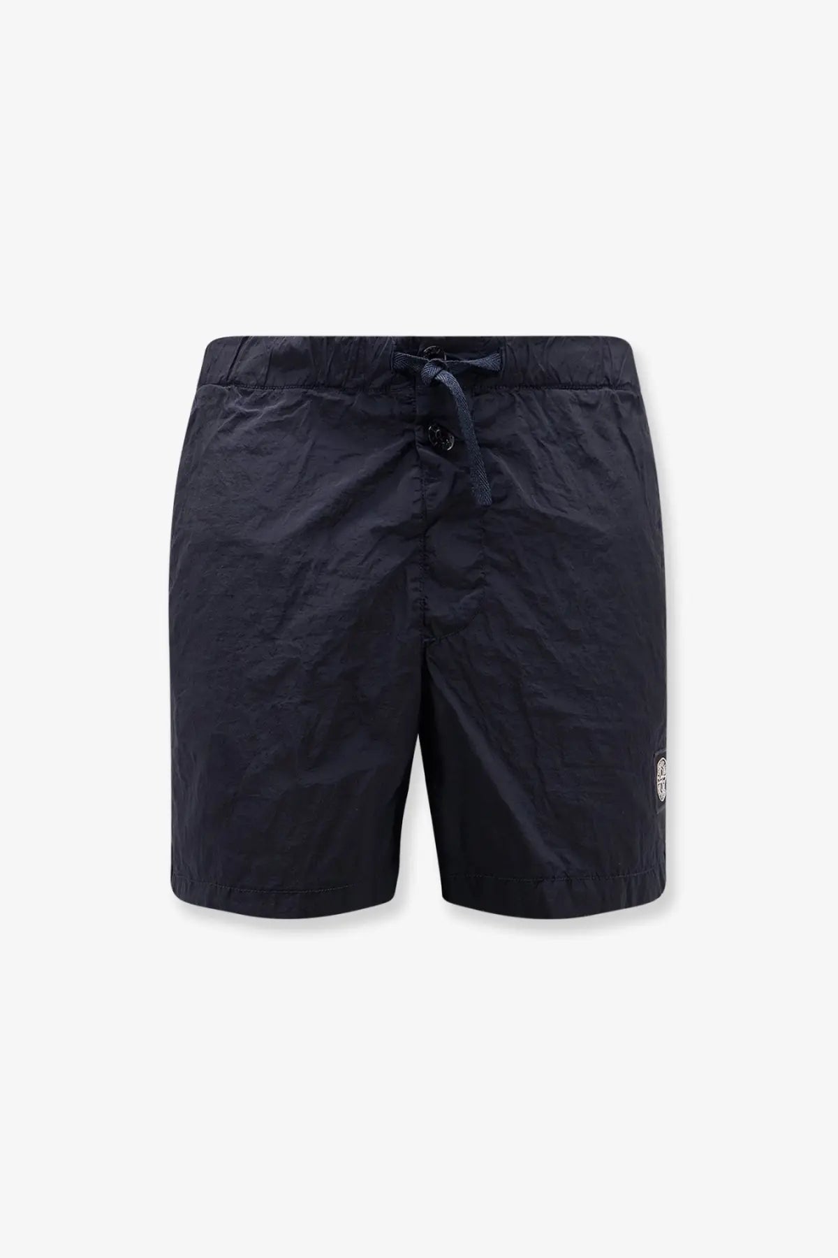 Stone island men’s econylon swim trunks in dark navy blue with elastic waistband drawstring and white logo on lower right leg