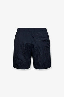 Stone island men’s econylon swim trunks blue in dark navy with subtle textured pattern and elastic waistband