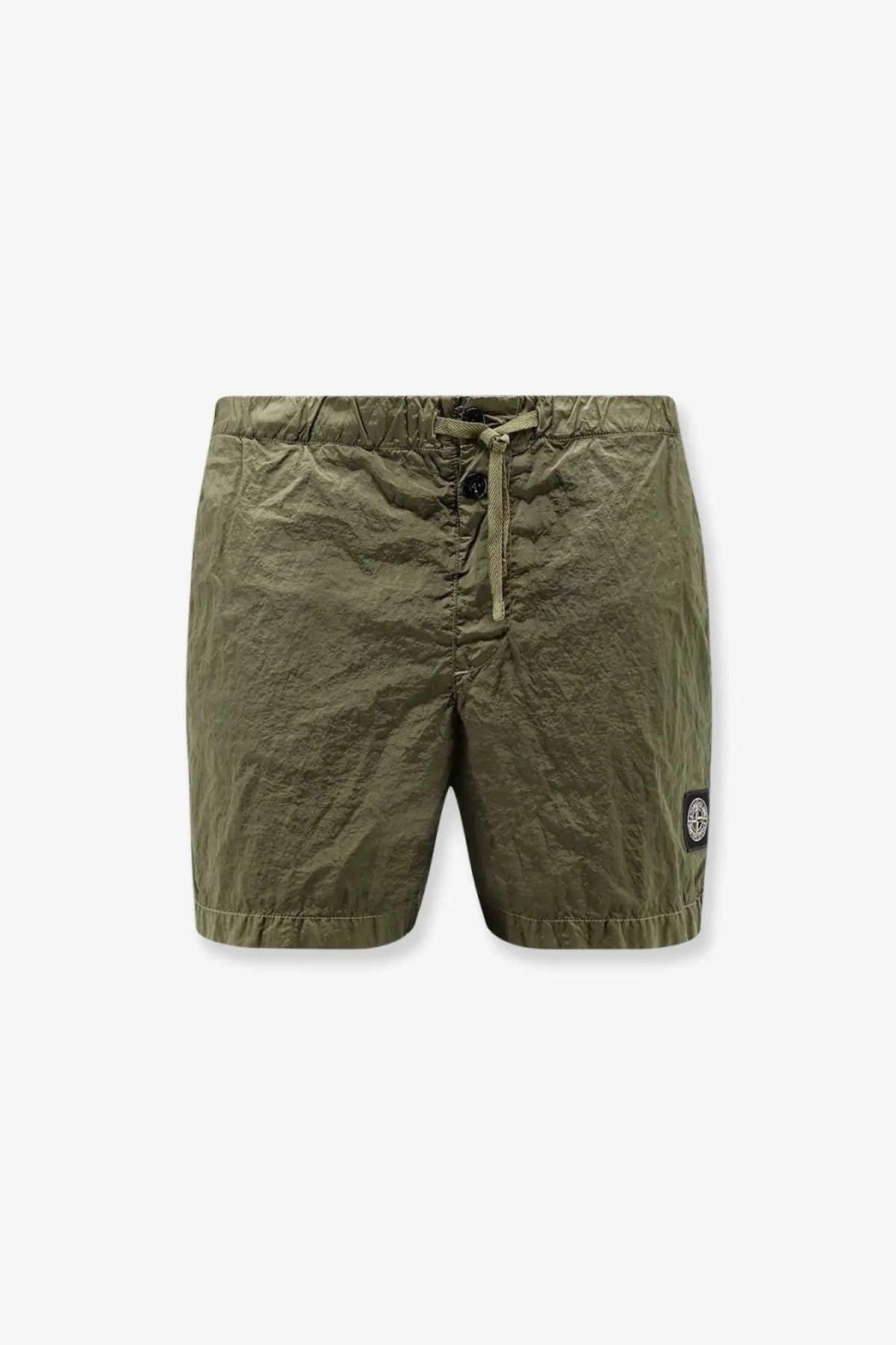 Stone Island men’s econylon swim trunks in olive green with drawstring waist and circular logo patch on lower right leg