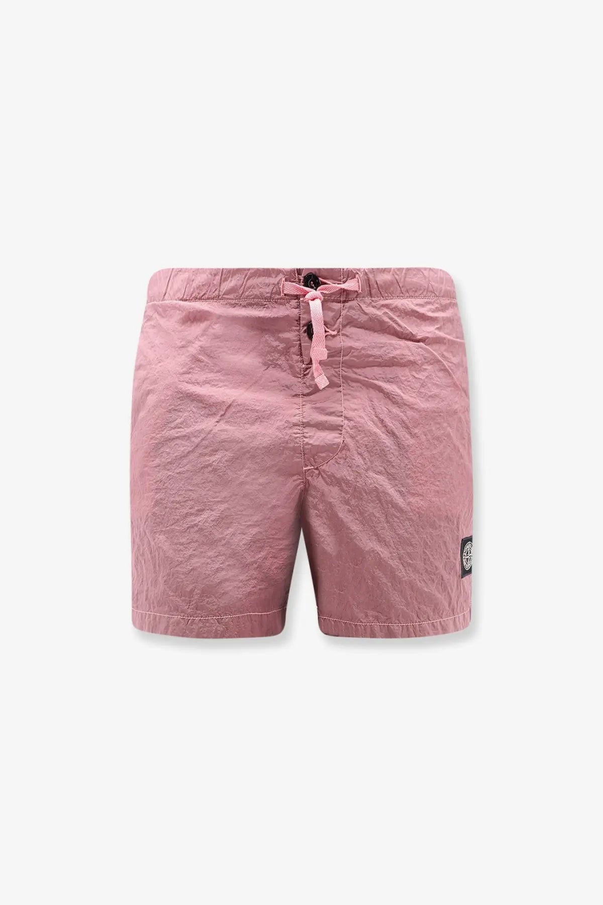 Stone Island men’s pink econylon swim trunks with textured fabric drawstring waist and black logo patch on the side