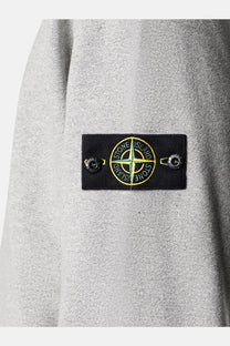 Stone Island men’s élange cotton sweatshirt grey with black patch featuring yellow and green compass logo and metallic buttons