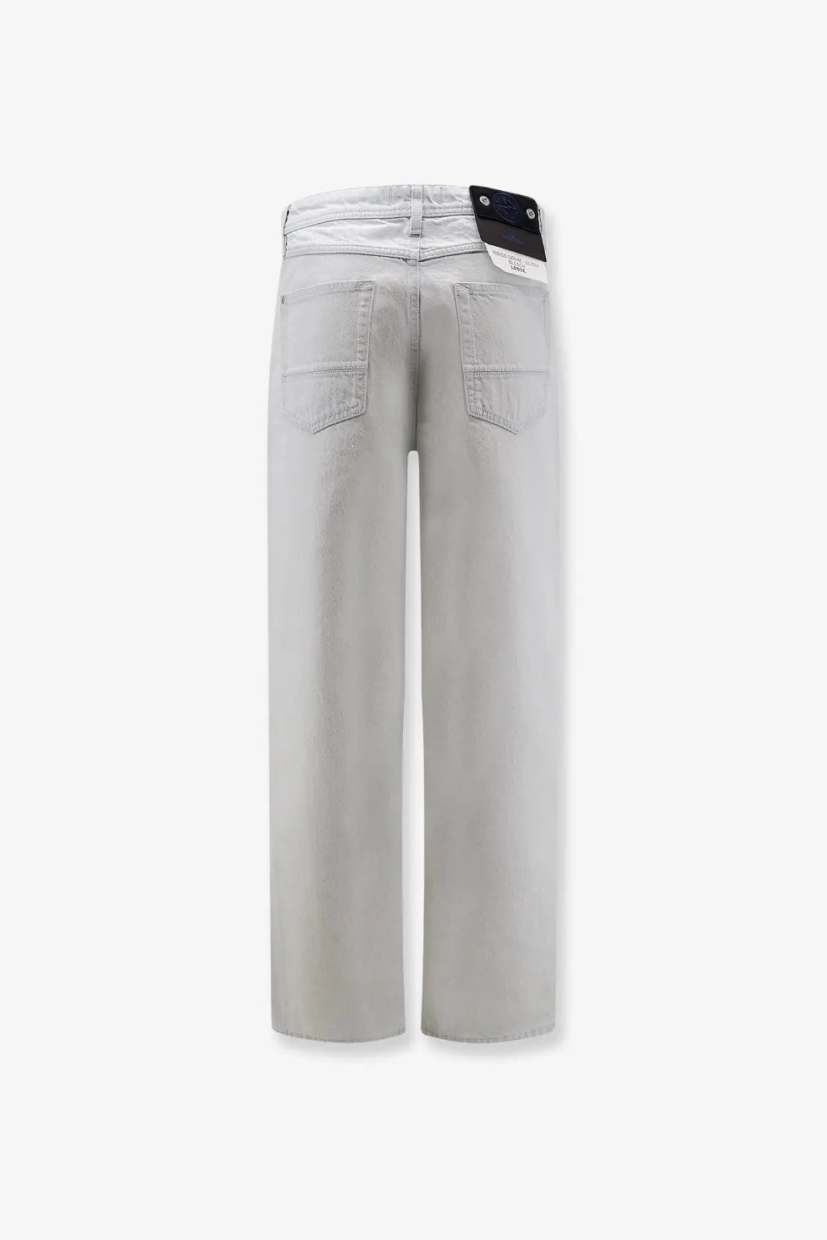Stone Island men’s faded effect jeans in blue featuring light gray wide-leg denim trousers with subtle stitching details