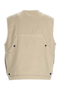 Stone Island men’s beige utility gilet oversize with two front pockets and black button closures on front and hem