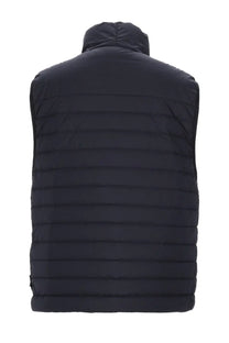 Black quilted puffer vest with hood perfect for layering in cold weather