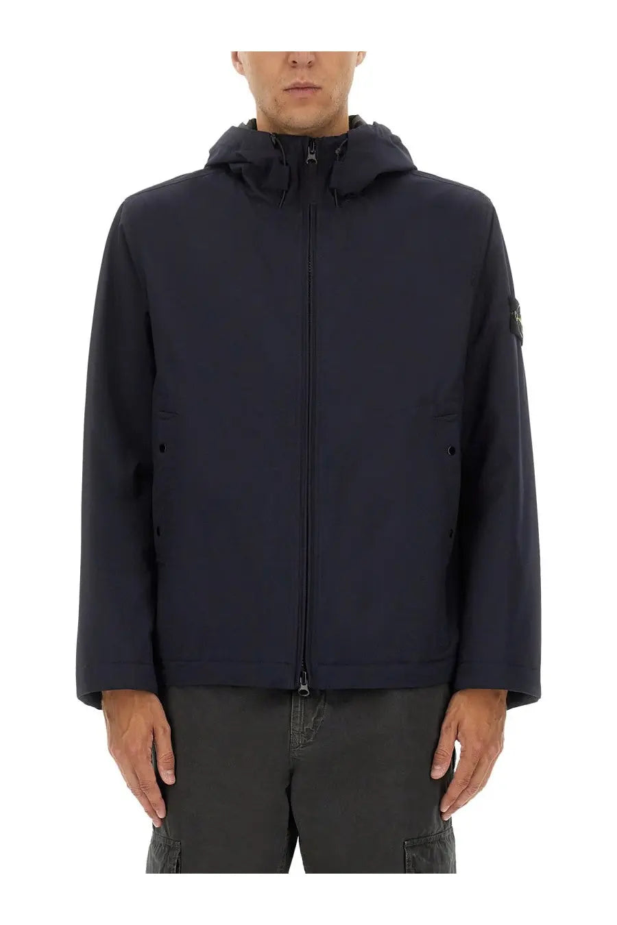 Stone Island men’s dark navy blue hooded jacket with sleek modern design and subtle branding on the sleeve