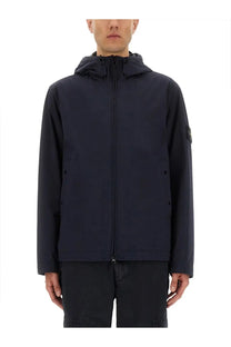 Stone Island men’s dark navy blue hooded jacket with full-length zipper and branding patch on left sleeve