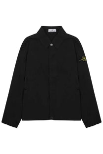Stone Island men’s black jacket with button closures and subtle yellow logo on the sleeve