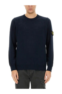 Stone Island men’s jersey blue dark navy knit sweater with yellow logo patch on the left sleeve