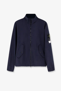 Stone Island men’s light soft shell Edye technology jacket in dark navy blue with high collar and chest flap pockets