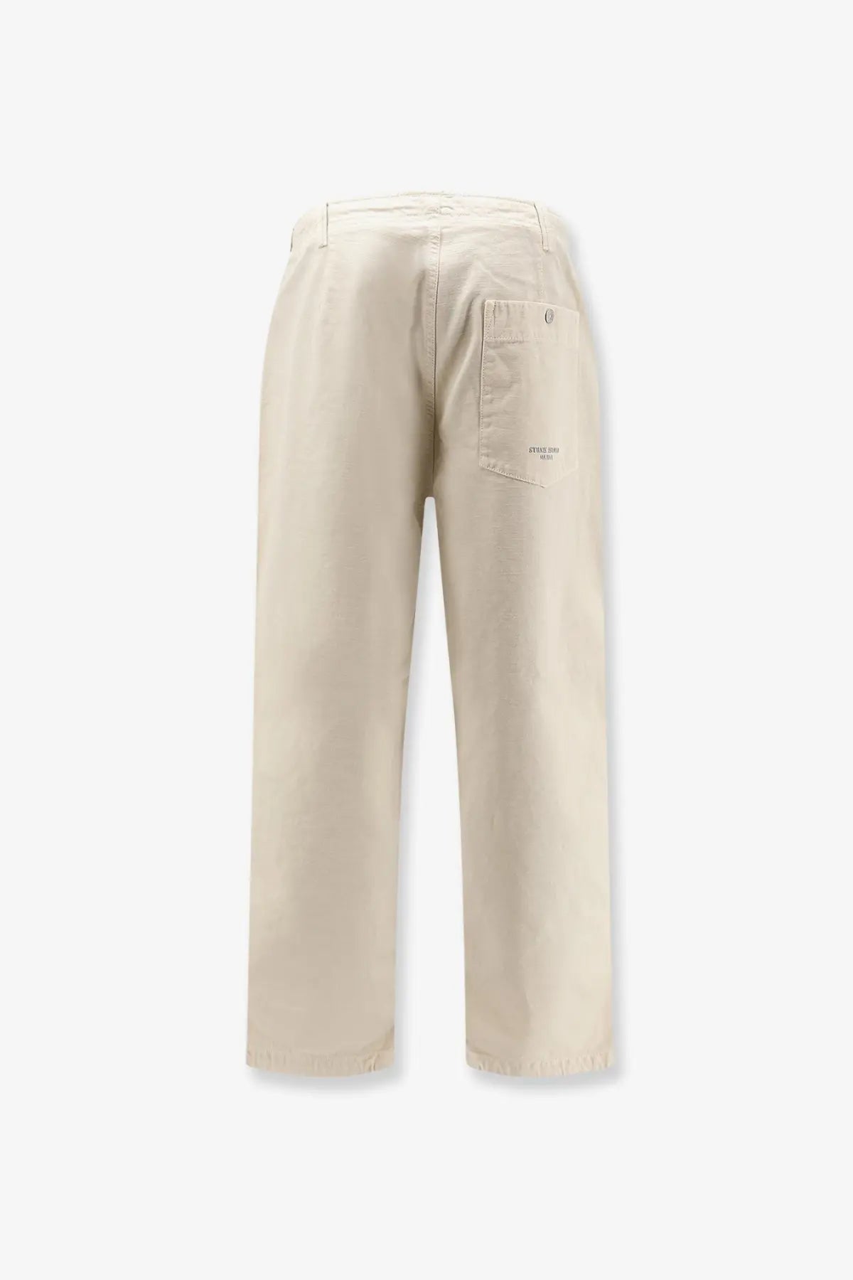 Beige stone island men’s loose cotton trousers with wide legs and subtle brand logo on the back pocket shown from the back