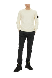 Stone Island men’s cream-colored crewneck sweater with black logo patch on left sleeve in Maglia Con White style
