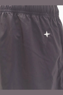 Stone island men’s black nylon athletic shorts with a white star logo embroidered on the side
