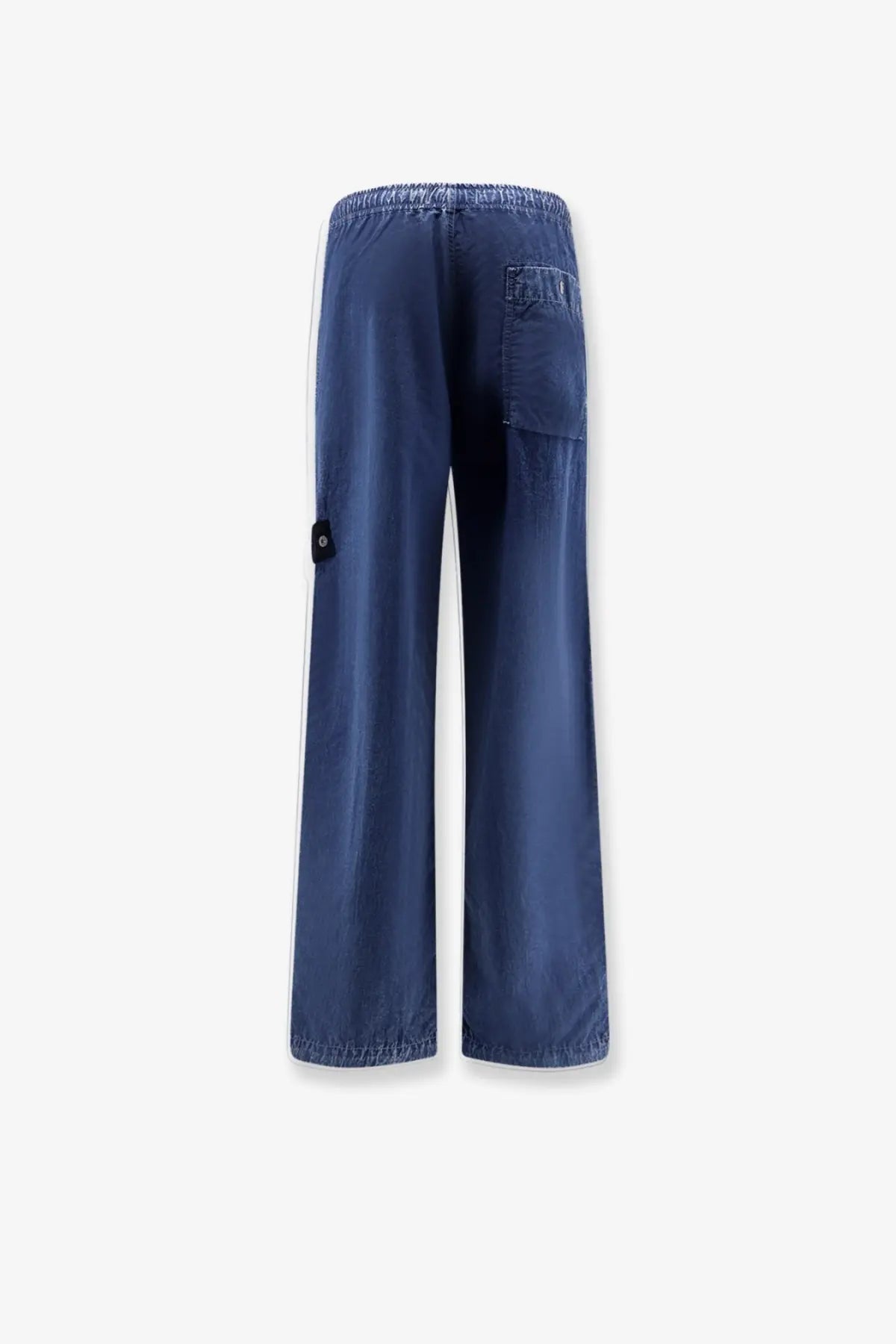 Stone Island men’s blue nylon trousers with wide-leg fit white side stripe and elastic waistband front view