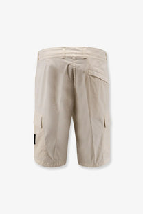 Stone Island men’s beige organic cotton cargo shorts with multiple pockets and subtle brand patch on the side